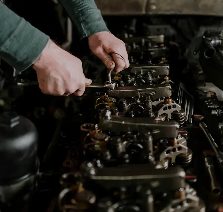 working on engine with wrench