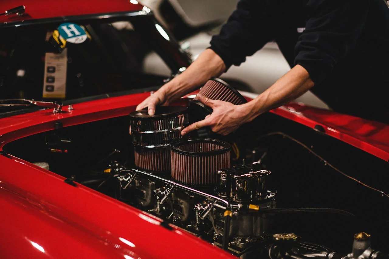 mechanic working on high performance car